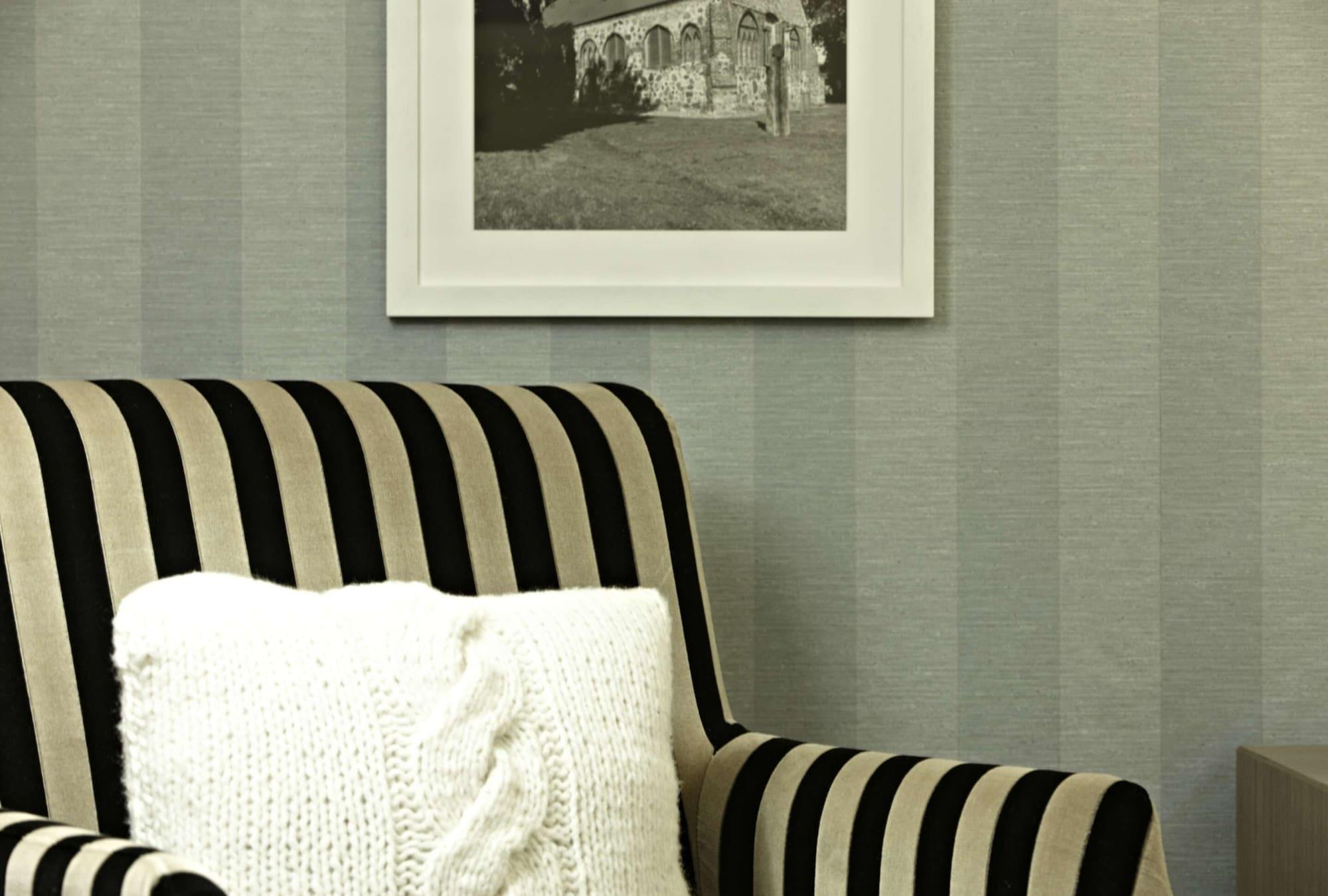 ชไตเกนแบร์เกอร์ แกรนด์โฮเต็ล แอนด์ สปา เฮริงสดอร์ฟ Hotel ภายนอก รูปภาพ A chair with striped upholstery